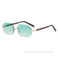 New European and American fashion frameless polygon Sunglasses Women's gradually changing color Sunglasses trend wood grain leg